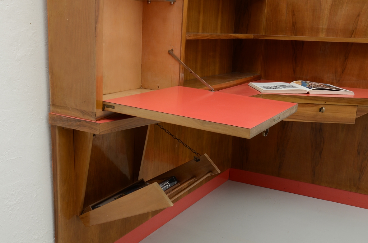 Stunning corner desk with newspaper holder, bar and shelves. Italy, 1950's.