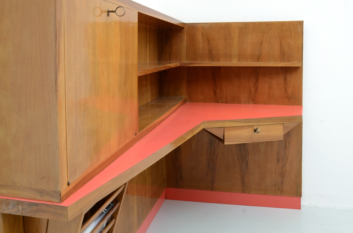 Stunning corner desk with newspaper holder, bar and shelves. Italy, 1950's.
