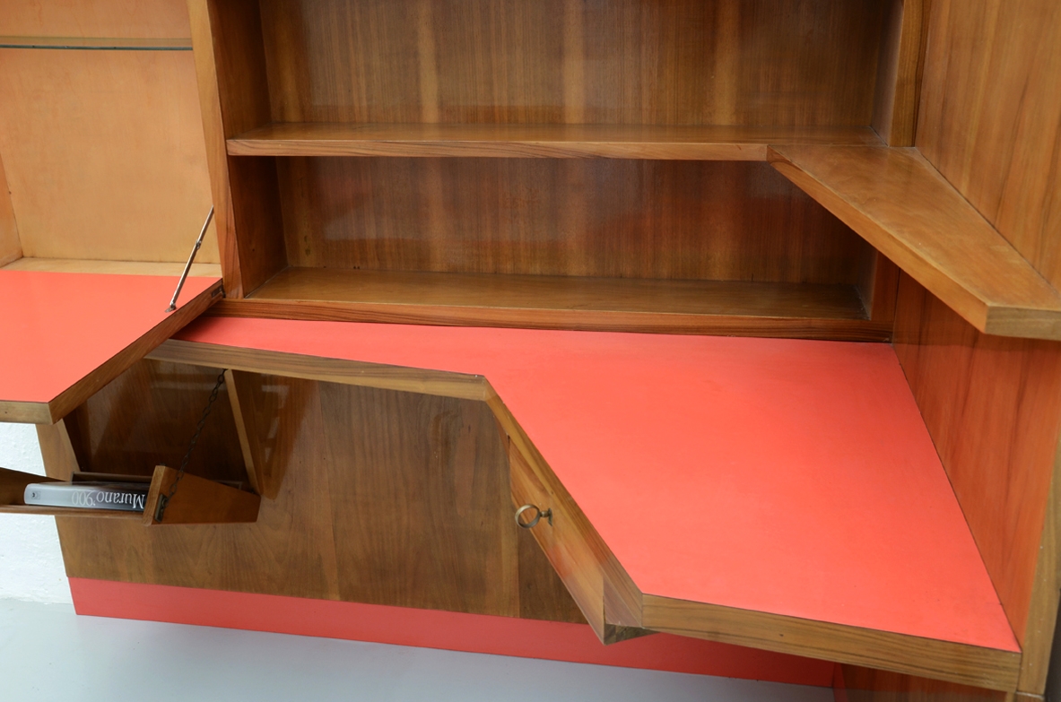Stunning corner desk with newspaper holder, bar and shelves. Italy, 1950's.