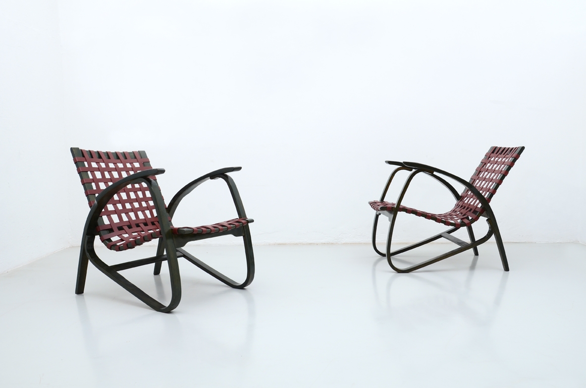 Jan Vanek, stunning pair of easy chairs in bent wood, polished with their original dark green color, Prague 1949.
