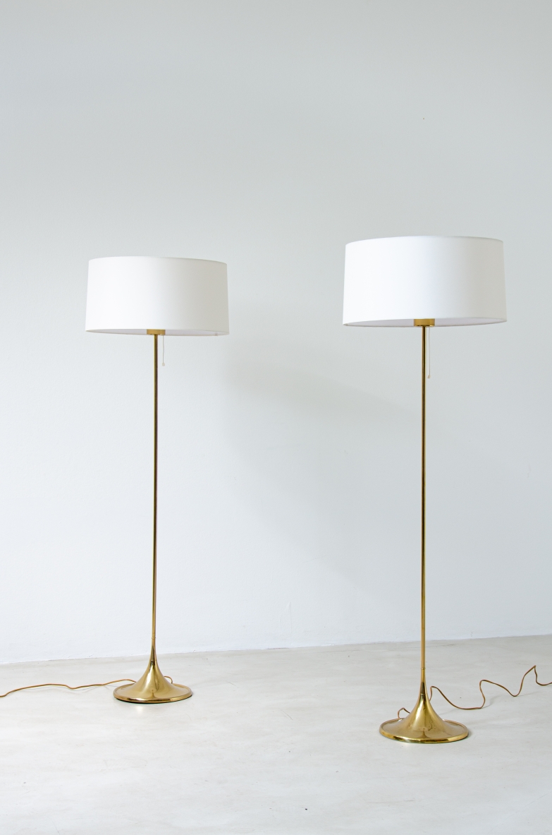 Pair of 1950's Scandinavian Bergboms floor lamps in brass.