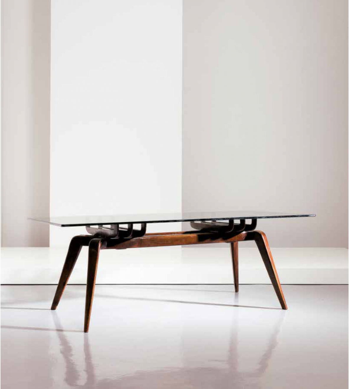 Gianni Vigorelli, 1950's stunning dining table with a beautiful carved wooden base and crystal glass top.