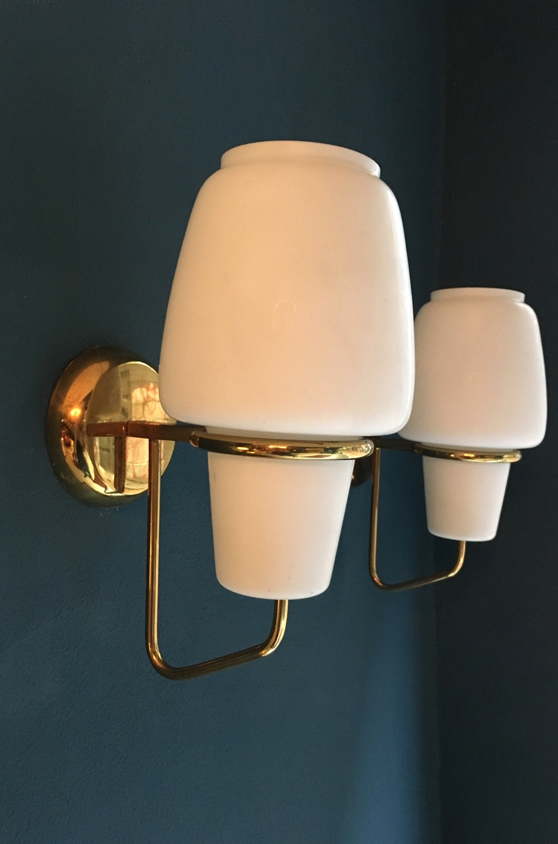 Pair of 1950's wall lights in brass and opaline glass produced by Arredoluce.