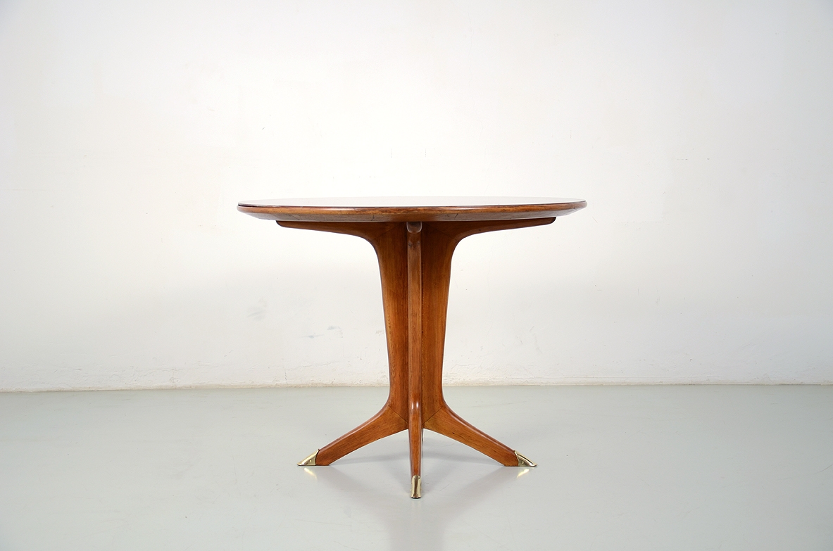 Italian 1950's round dining table with nice crossed legs and opaline glass top.
