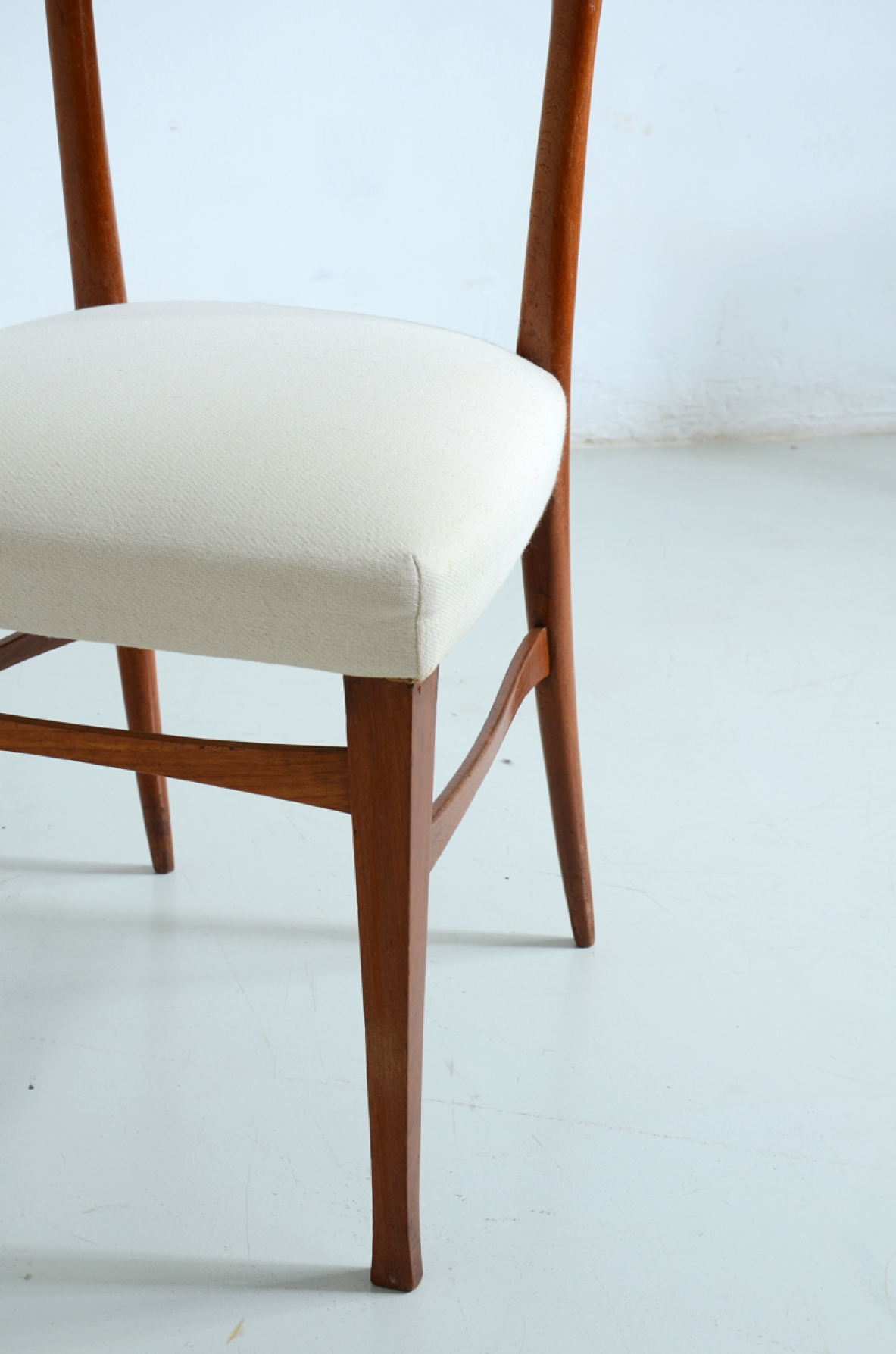 Elegant group of six cherry wood chairs with upholstered seat.
