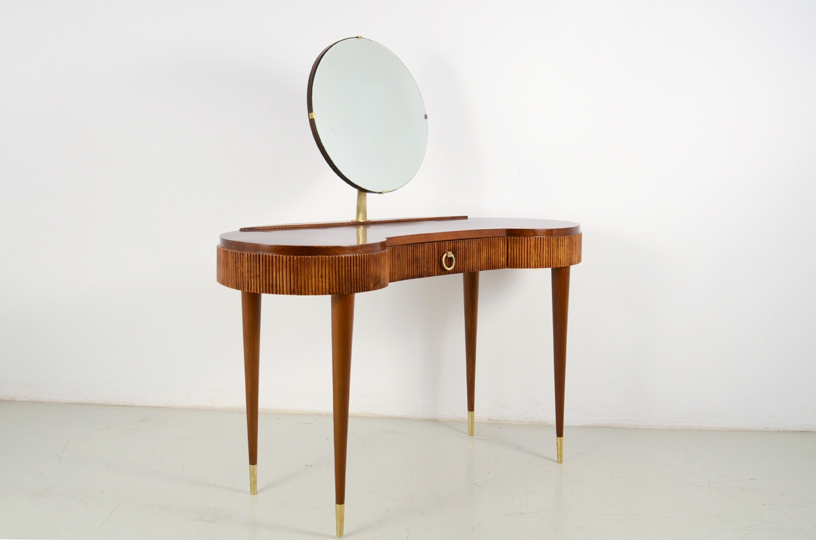 Italian 1950's Console table with adjustable round mirror based on thin elegant legs with brass tips.