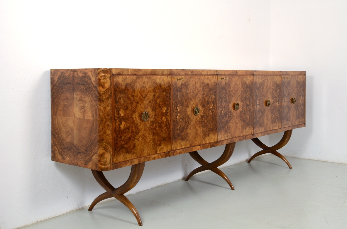 Tomaso Buzzi, important 1930's sideboard on elegant legs, marble top and a bar inside. 