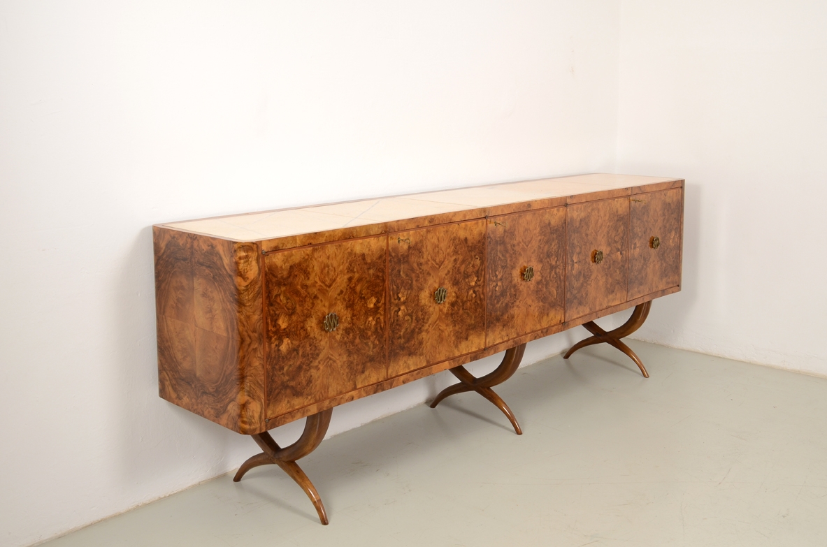 Tomaso Buzzi, important 1930's sideboard on elegant legs, marble top and a bar inside. 
