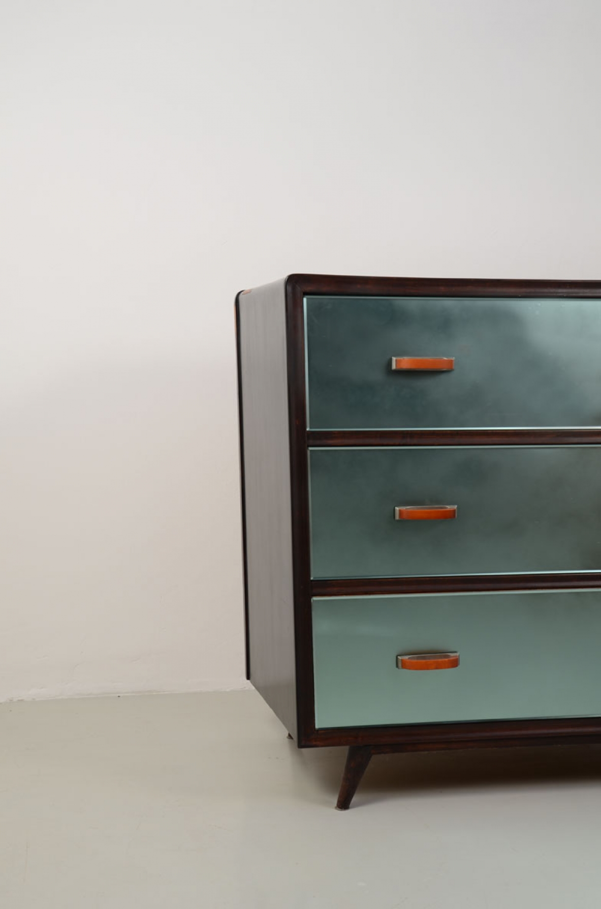 Italian splendid 1940's chest of drawers with light blue mirrored front and nice original handles.