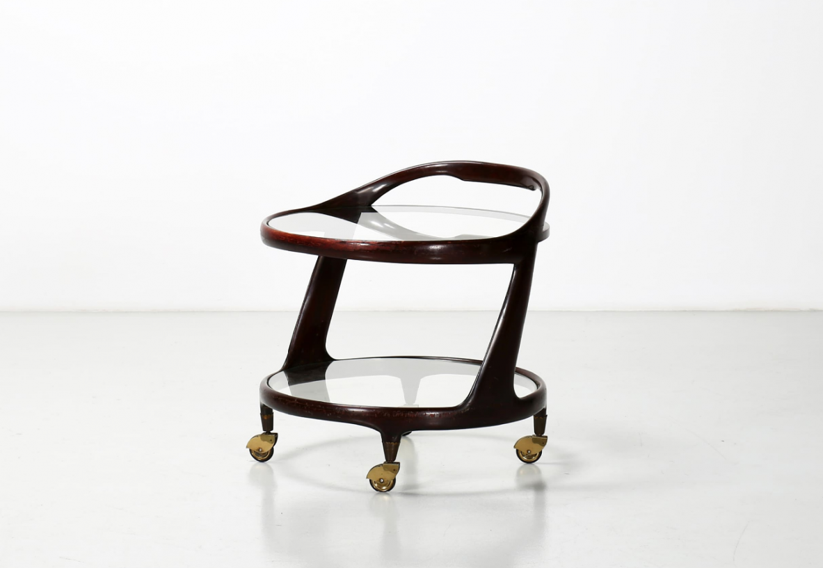 Italian 1950's trolley in mahogany with brass details and ground crystal shelves.