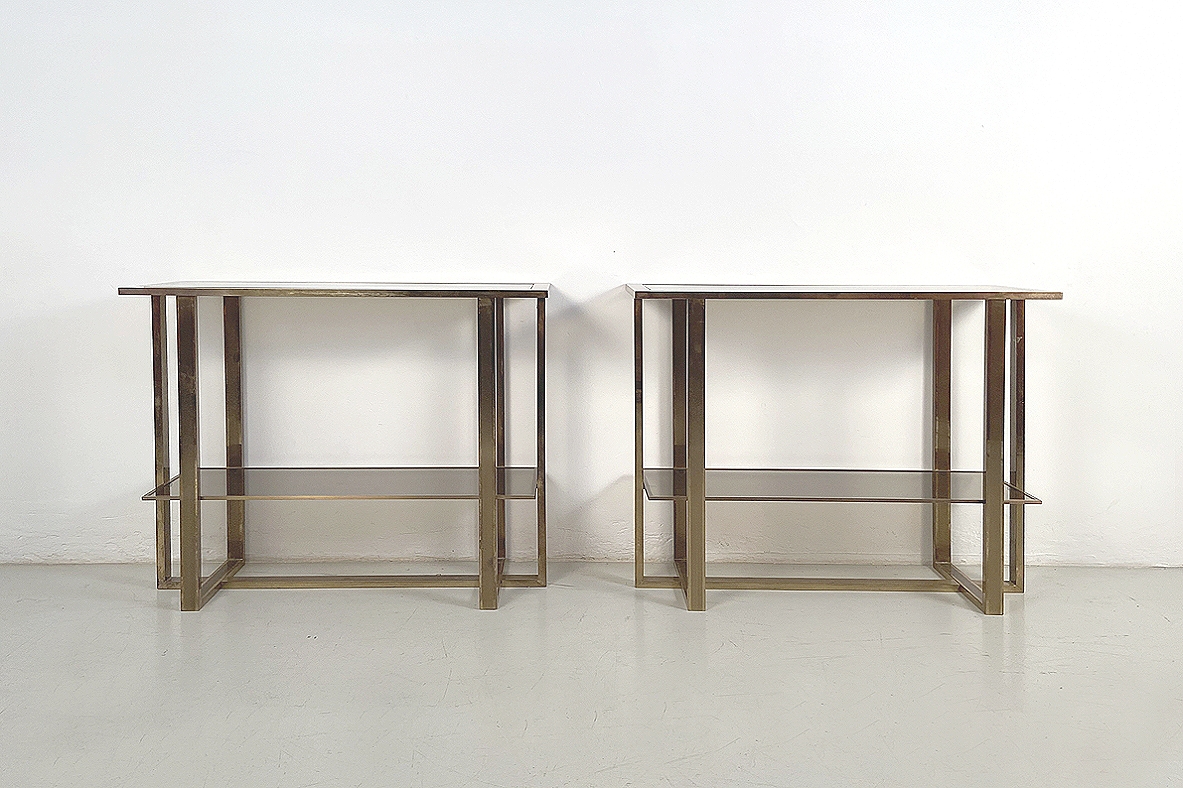 Romeo Rega, pair of Italian 1970's console tables in polished brass with two shelves in light brown crystal glass.