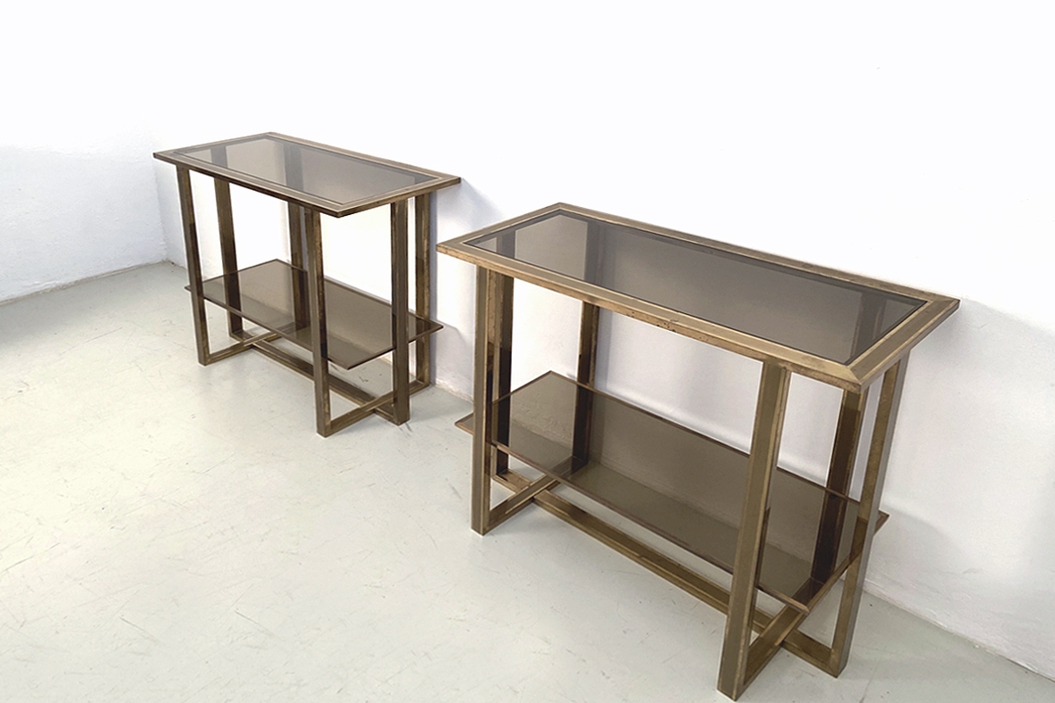 Romeo Rega, pair of Italian 1970's console tables in polished brass with two shelves in light brown crystal glass.