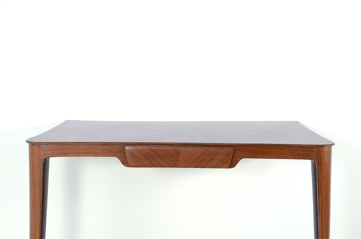 Pair of elegant console tables with a central drawer. Italy, 1950's.