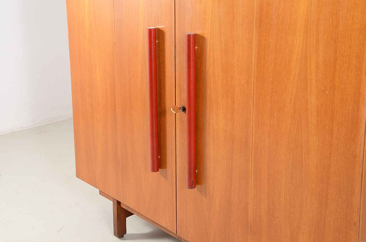 Ultra-functional office or smart-working cabinet in oak wood with various compartments, drawers and a pull-out writing desk. Italiy 1960's.