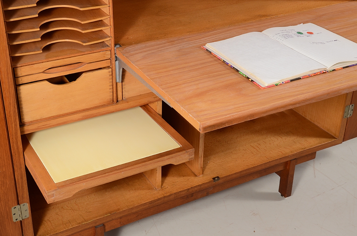 Ultra-functional office or smart-working cabinet in oak wood with various compartments, drawers and a pull-out writing desk. Italiy 1960's.