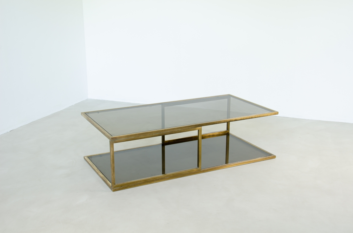 Romeo Rega, low table with brass structure and double top in smoked glass.  Italiy, Rome, 1970's.