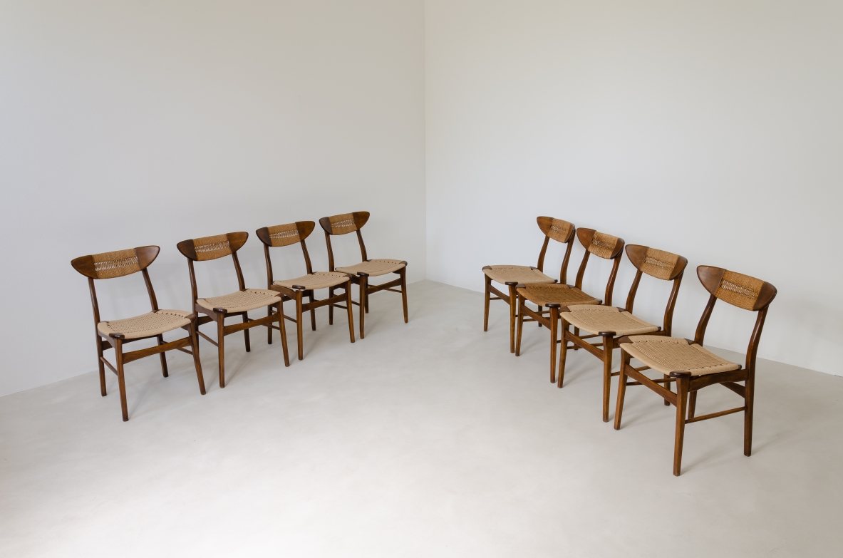 Set of 8 dining chairs with seat and back in woven straw. Scandinavia, 1960's.