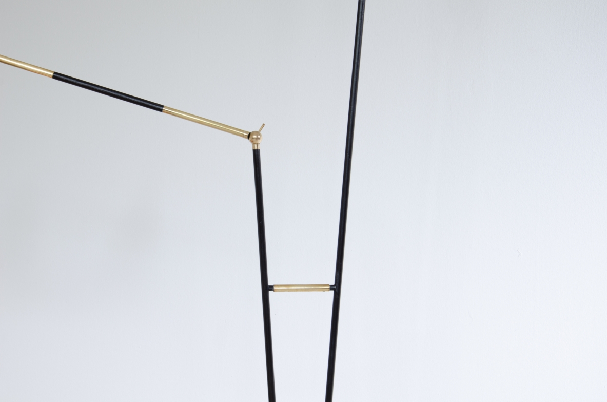 Stilux, lampada da terra in metallo e ottone a  due bracci di cui uno regolabile. Paralumi in metallo verniciato, Milano,1950ca.