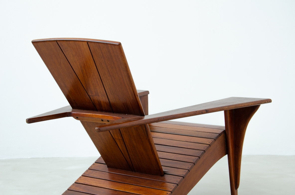 Stunning pair of Italian 1940's armchairs in wood with brass tips.