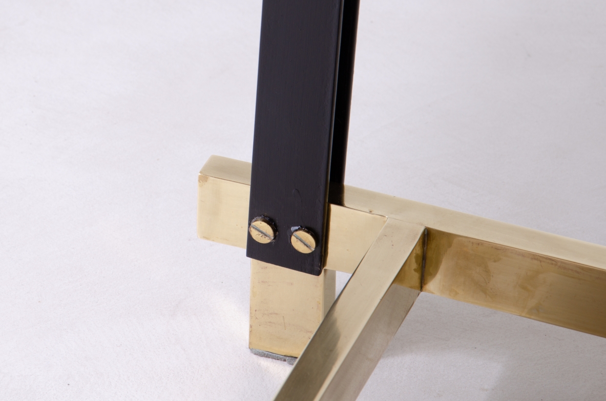 1960s extendable mahogany table with metal and brass structure.