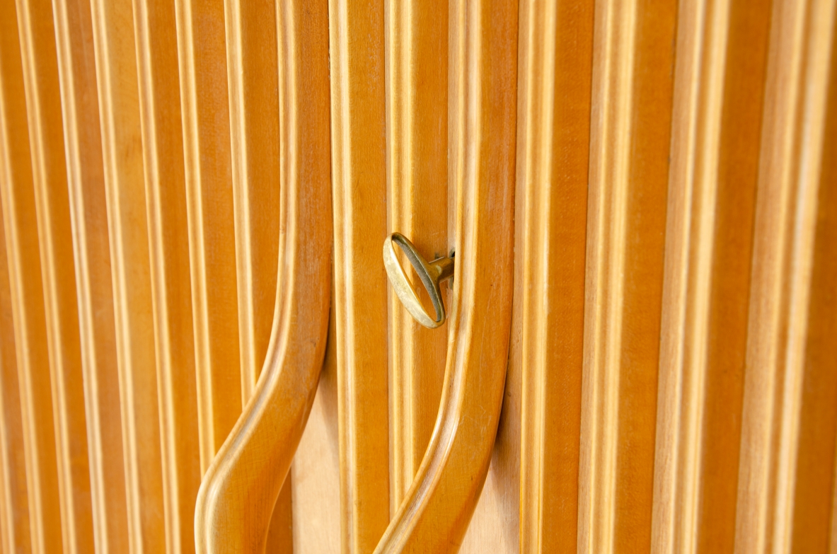 Four-door wardrobe in blond maplewood, Produced by Cassina, 1957.