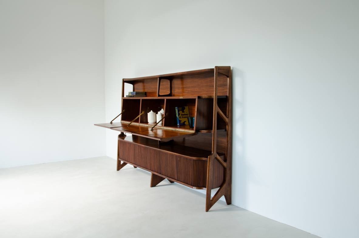 Ico Parisi, high cabinet with three central flap compartments and ribbed wood doors.