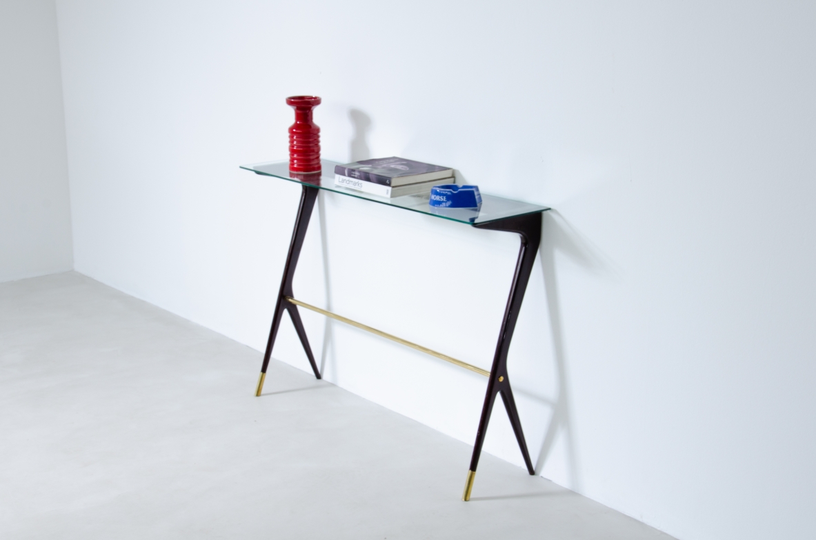 Elegant console table in stained wood with crystal glass top. Italy, 1950s