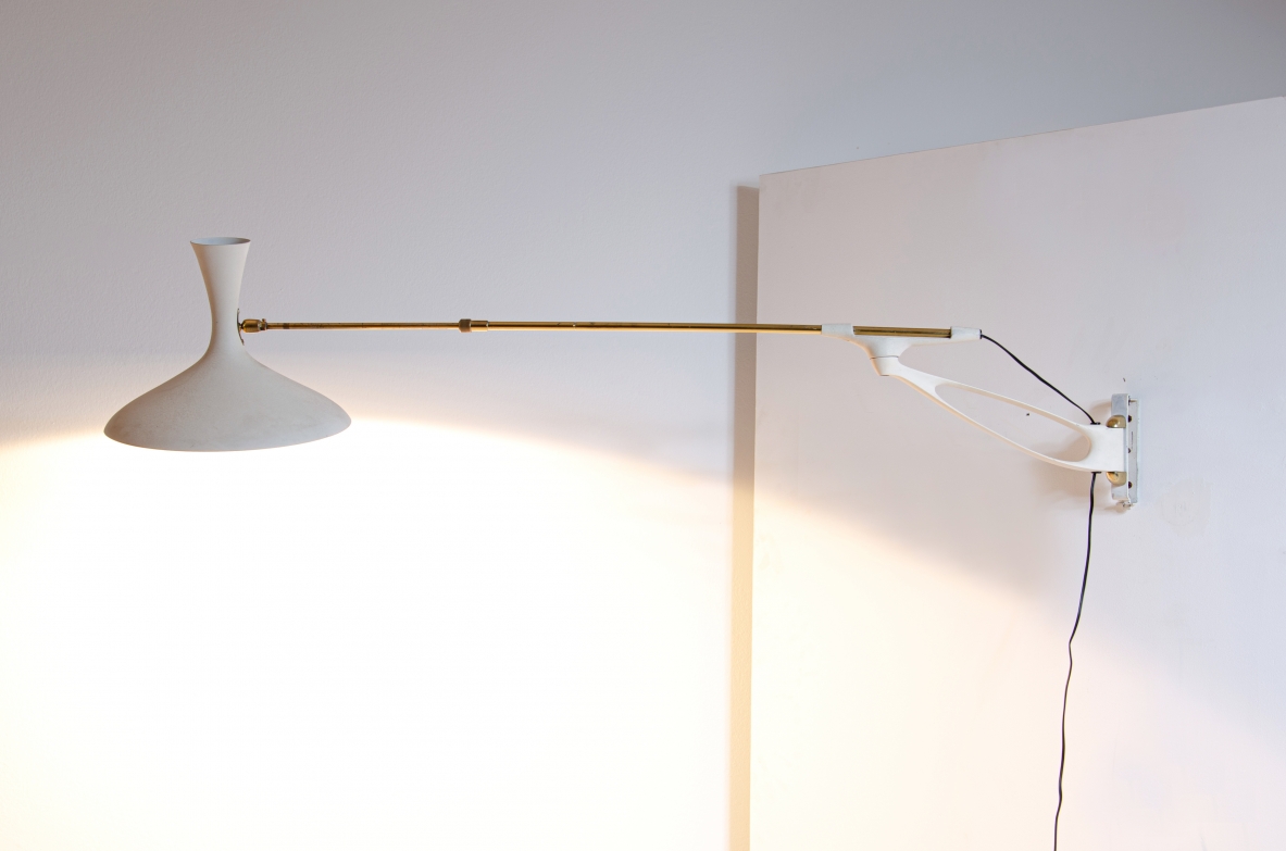 Wall lamp with adjustable arm and extendable stick.  Painted metal and brass, France 1950s.