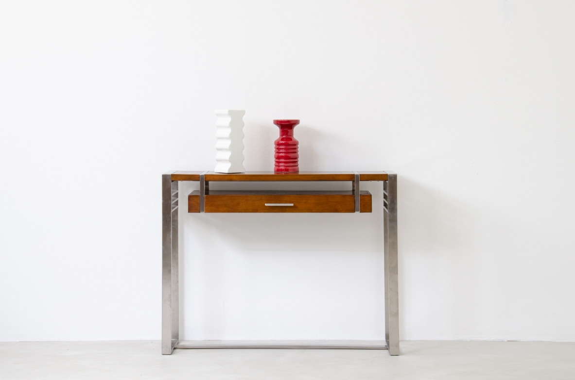 Modernist console table in steel and wood with one drawer.  France, 1935.