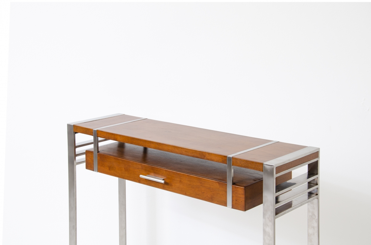 Modernist console table in steel and wood with one drawer.  France, 1935.