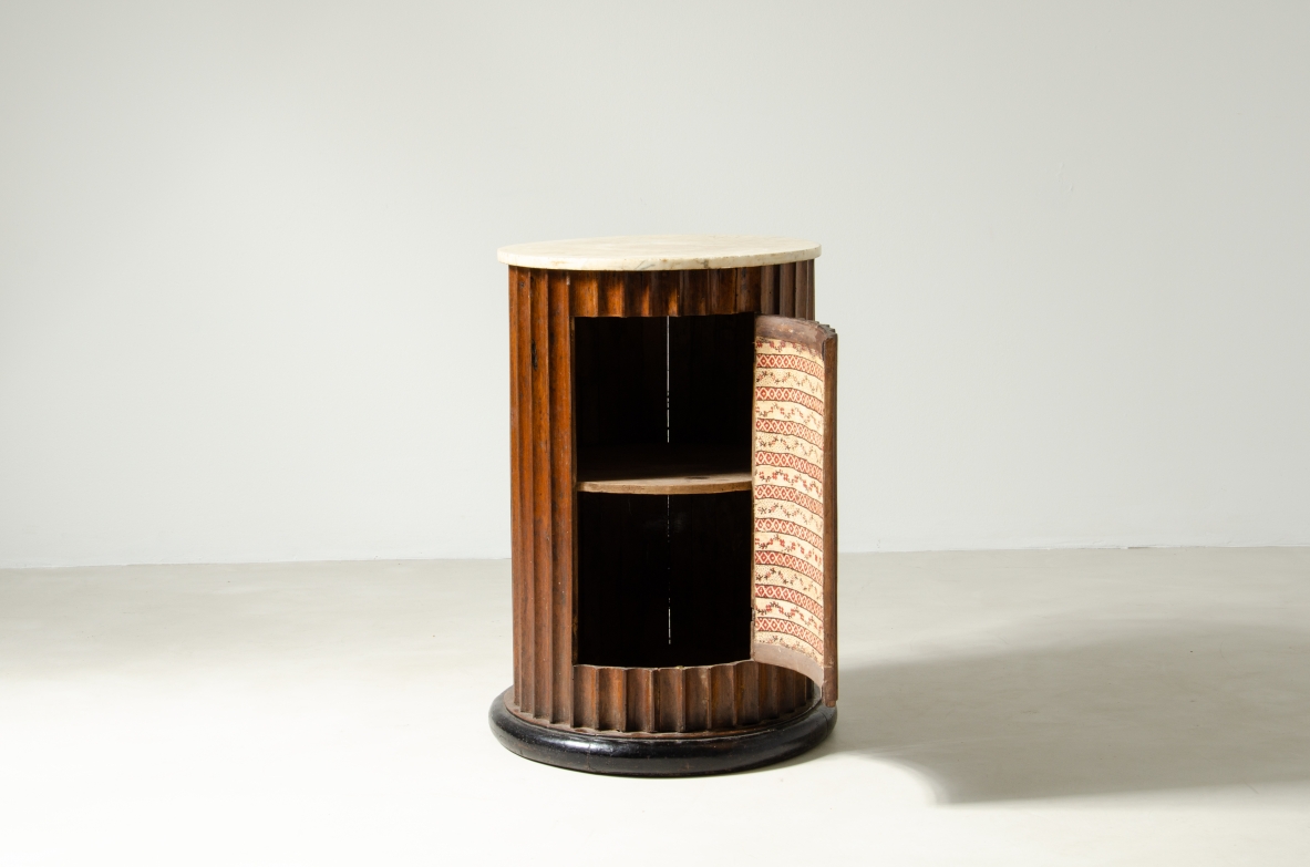Column in fluted walnut with door and top in marble.  Italian manufacture, late Empire period, around 1830s.
