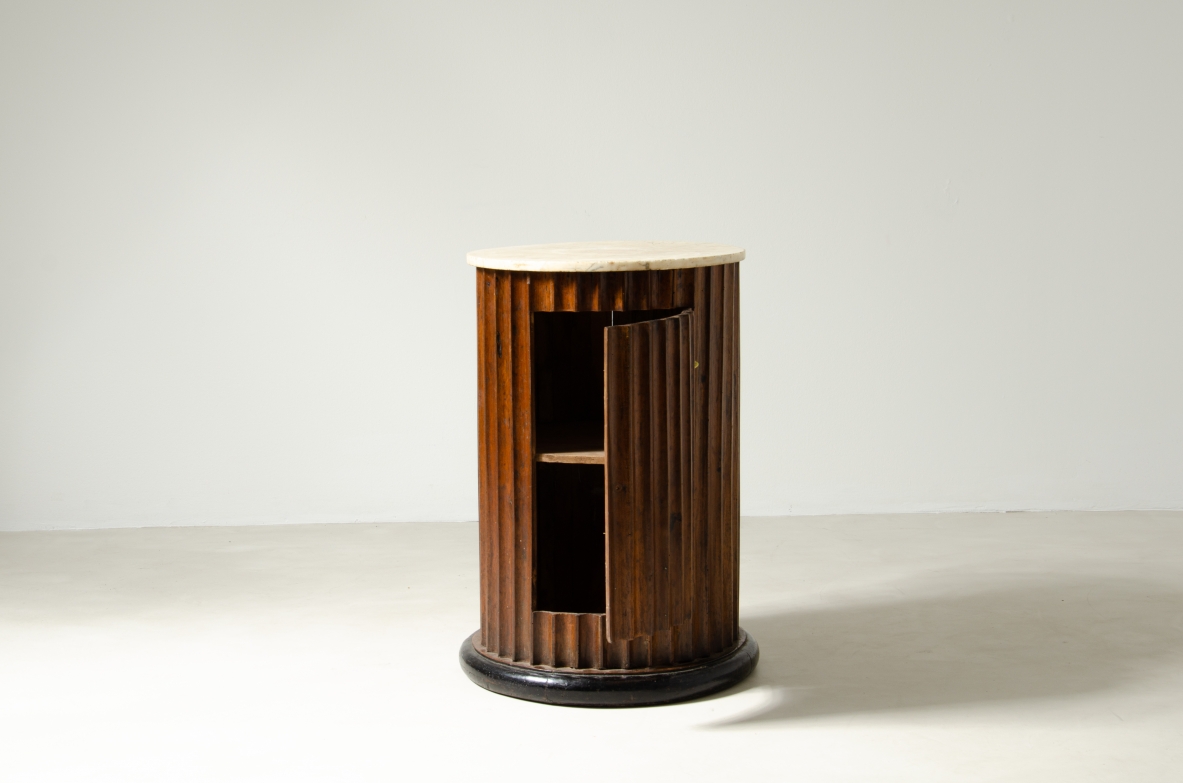Column in fluted walnut with door and top in marble.  Italian manufacture, late Empire period, around 1830s.