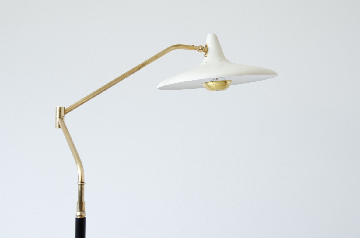 Stilnovo, floor lamp with articulated brass arm, adjustable in height and in all directions, painted metal shade and marble base.  Stilnovo brand, 1955.