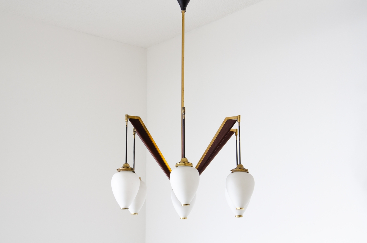Stilnovo, six-light chandelier with drop-shaped opaline glass diffusers with brass ends.