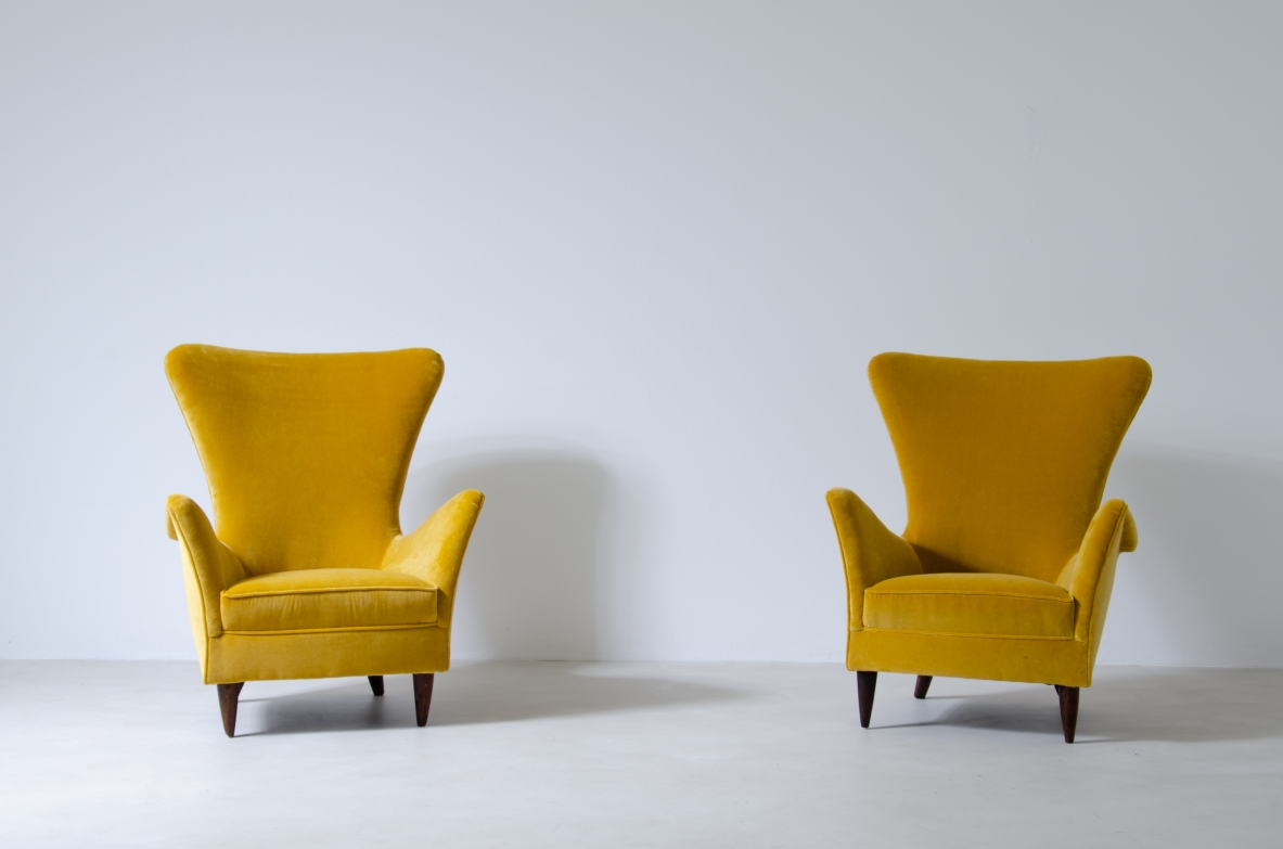 Pair of sculptural high back armchairs with velvet upholstery.  Italian manufacture, 1950s.