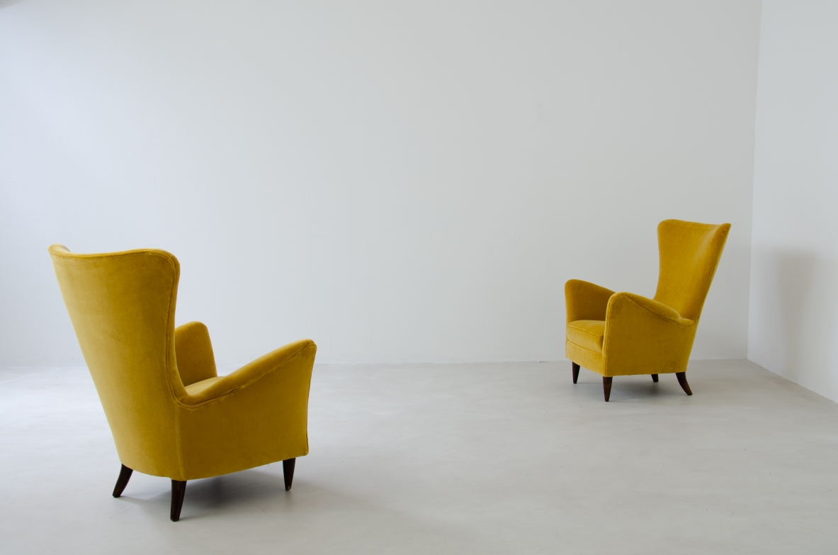 Pair of sculptural high back armchairs with velvet upholstery.  Italian manufacture, 1950s.