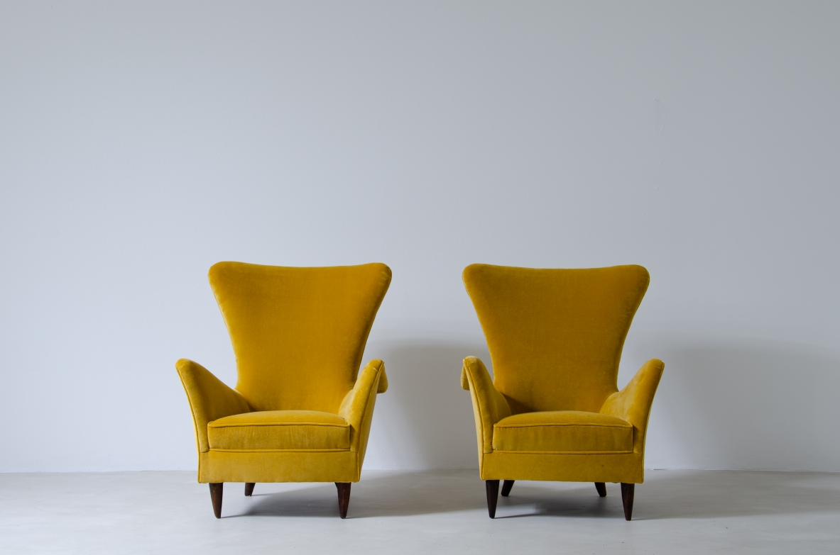 Pair of sculptural high back armchairs with velvet upholstery.  Italian manufacture, 1950s.