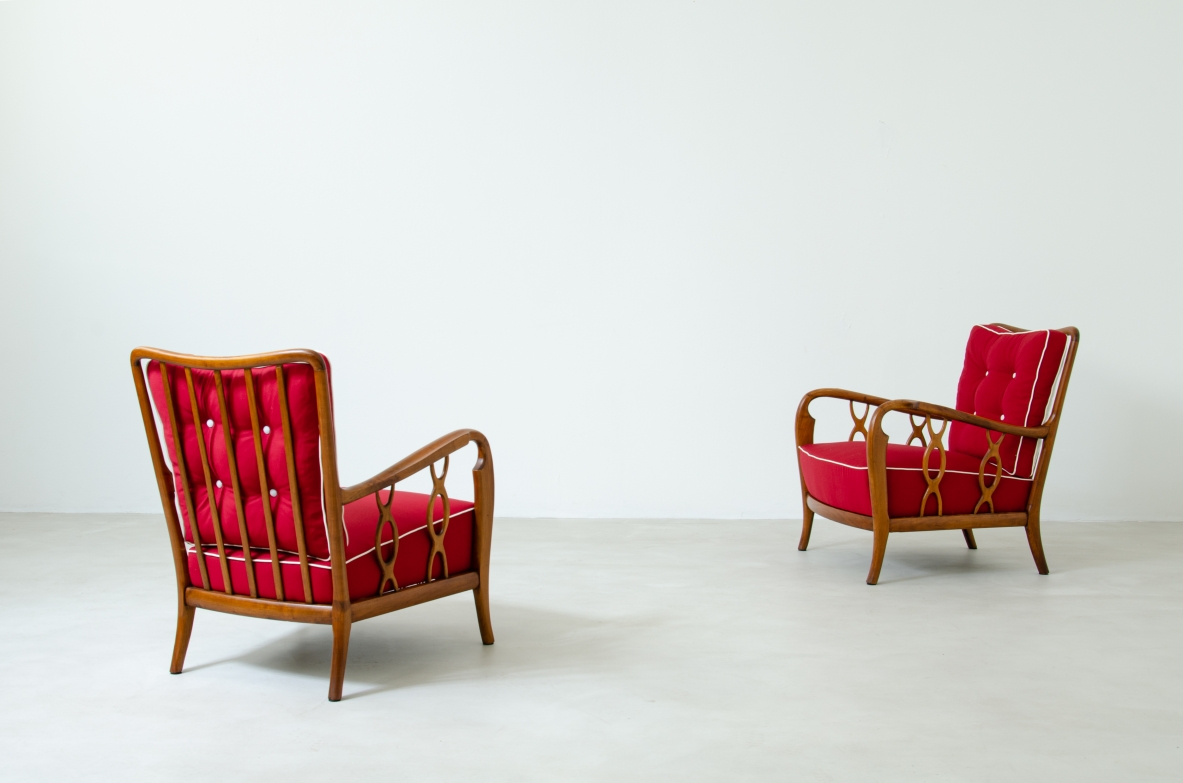 Pair of cherry wood armchairs with ribbon motif on the sides. Seat and back in padded fabric.  Attribution Paolo Buffa 1930s.