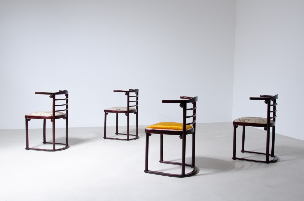Josef Hoffmann (1870-1956)  Rare set of four chairs in curved polished wood and upholstered seat.  Manufactured by JJ.Kohn, Vienna, 1907.