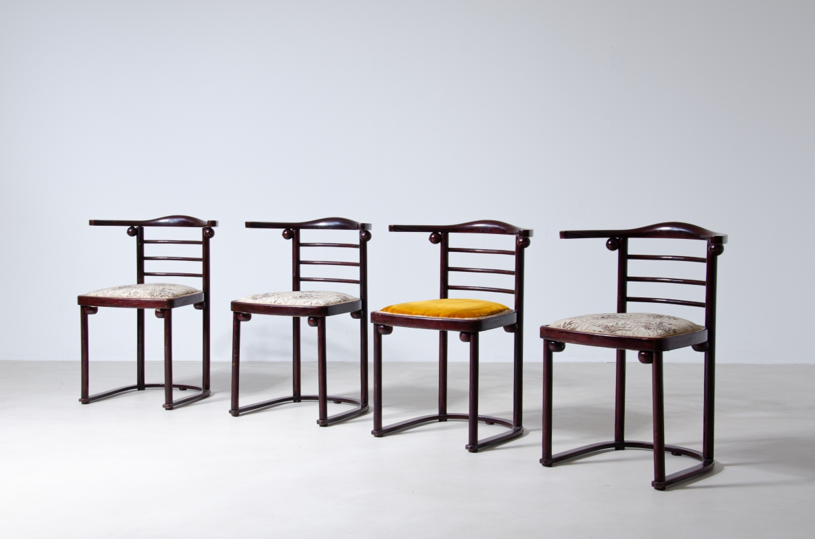 Josef Hoffmann (1870-1956)  Rare set of four chairs in curved polished wood and upholstered seat.  Manufactured by JJ.Kohn, Vienna, 1907.