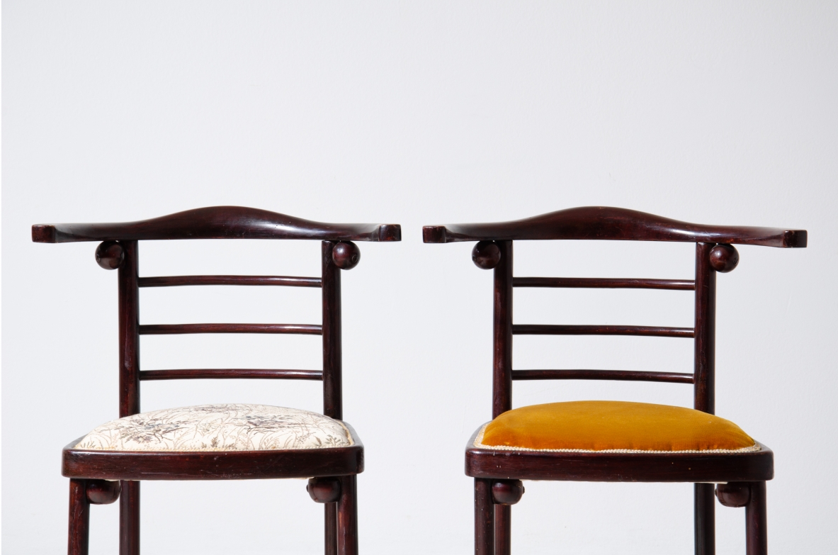 Josef Hoffmann (1870-1956)  Rare set of four chairs in curved polished wood and upholstered seat.  Manufactured by JJ.Kohn, Vienna, 1907.