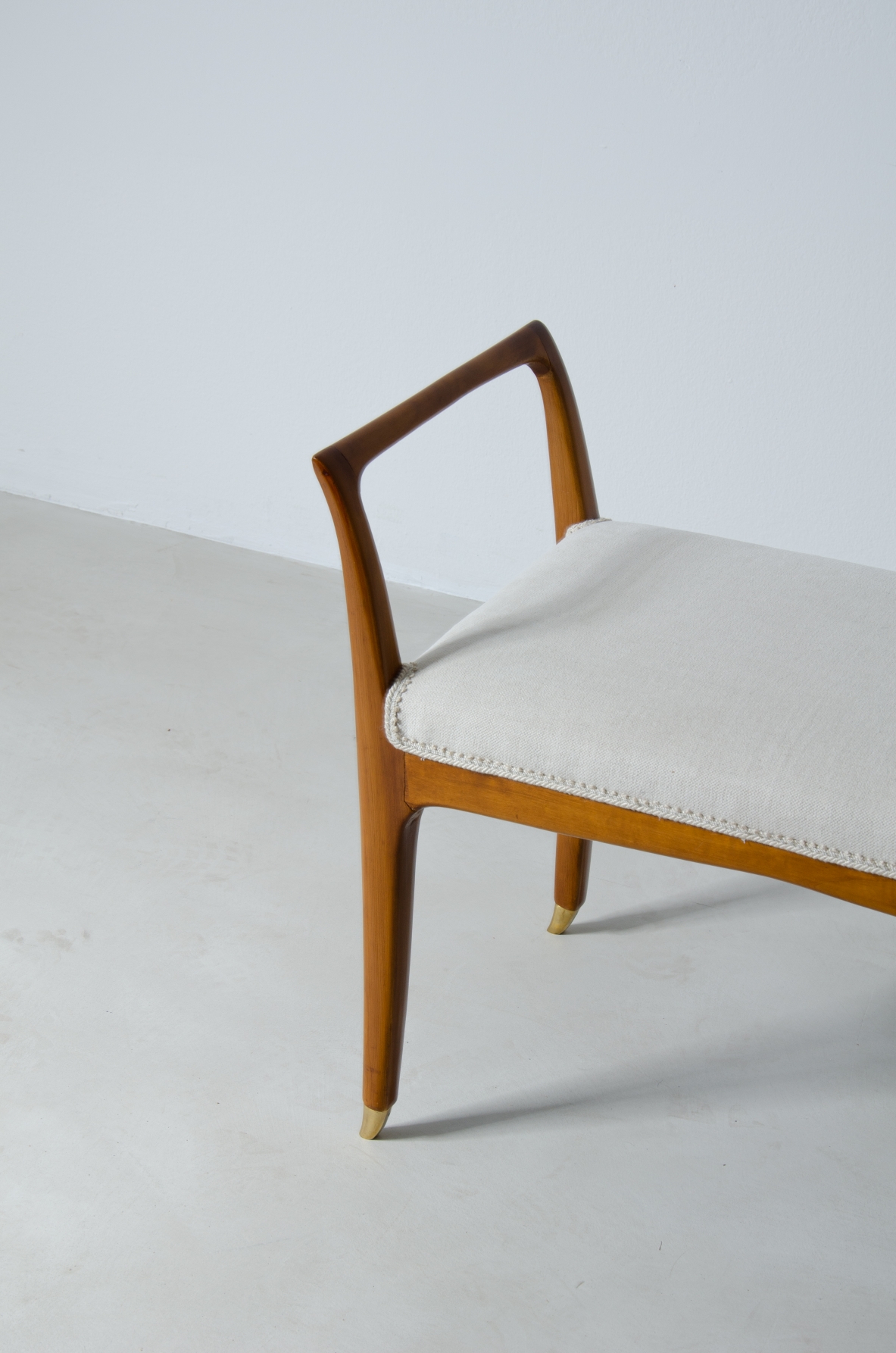 Very refined bench in cherry wood with brass tips.  Attribution Gio Ponti, 1950s.