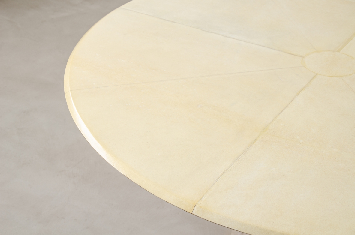 Rare Italian 1950's round table with parchment top, four drawers and marble base.