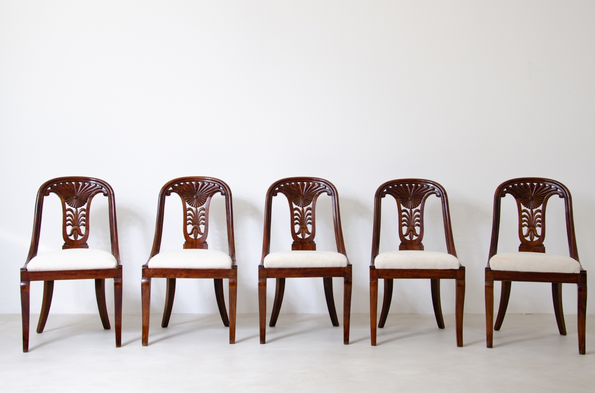 Rare set of 12 antique walnut cockpit chairs in walnut with carved back.  Charles X period,  Northern Italy, around 1830s.