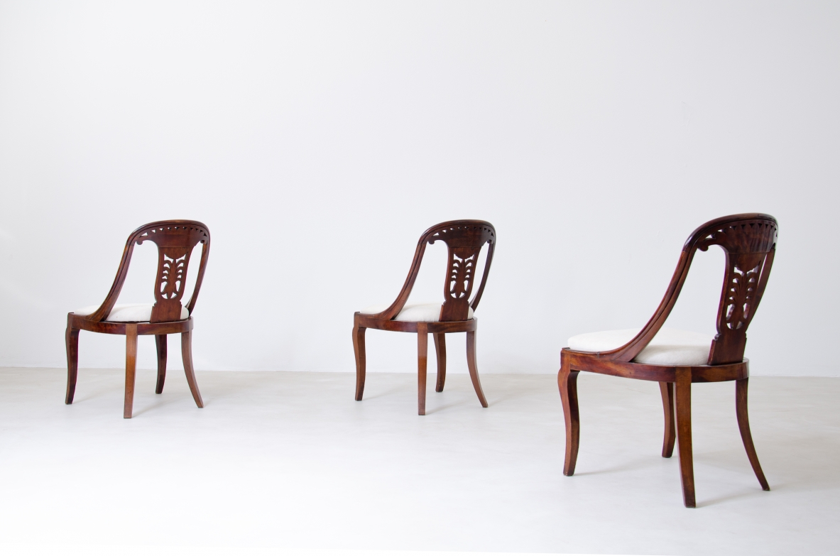 Rare set of 12 antique walnut cockpit chairs in walnut with carved back.  Charles X period,  Northern Italy, around 1830s.