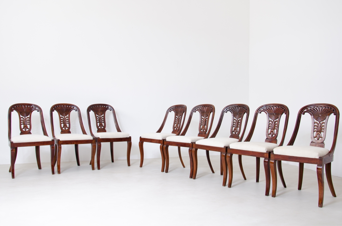 Rare set of 12 antique walnut cockpit chairs in walnut with carved back.  Charles X period,  Northern Italy, around 1830s.