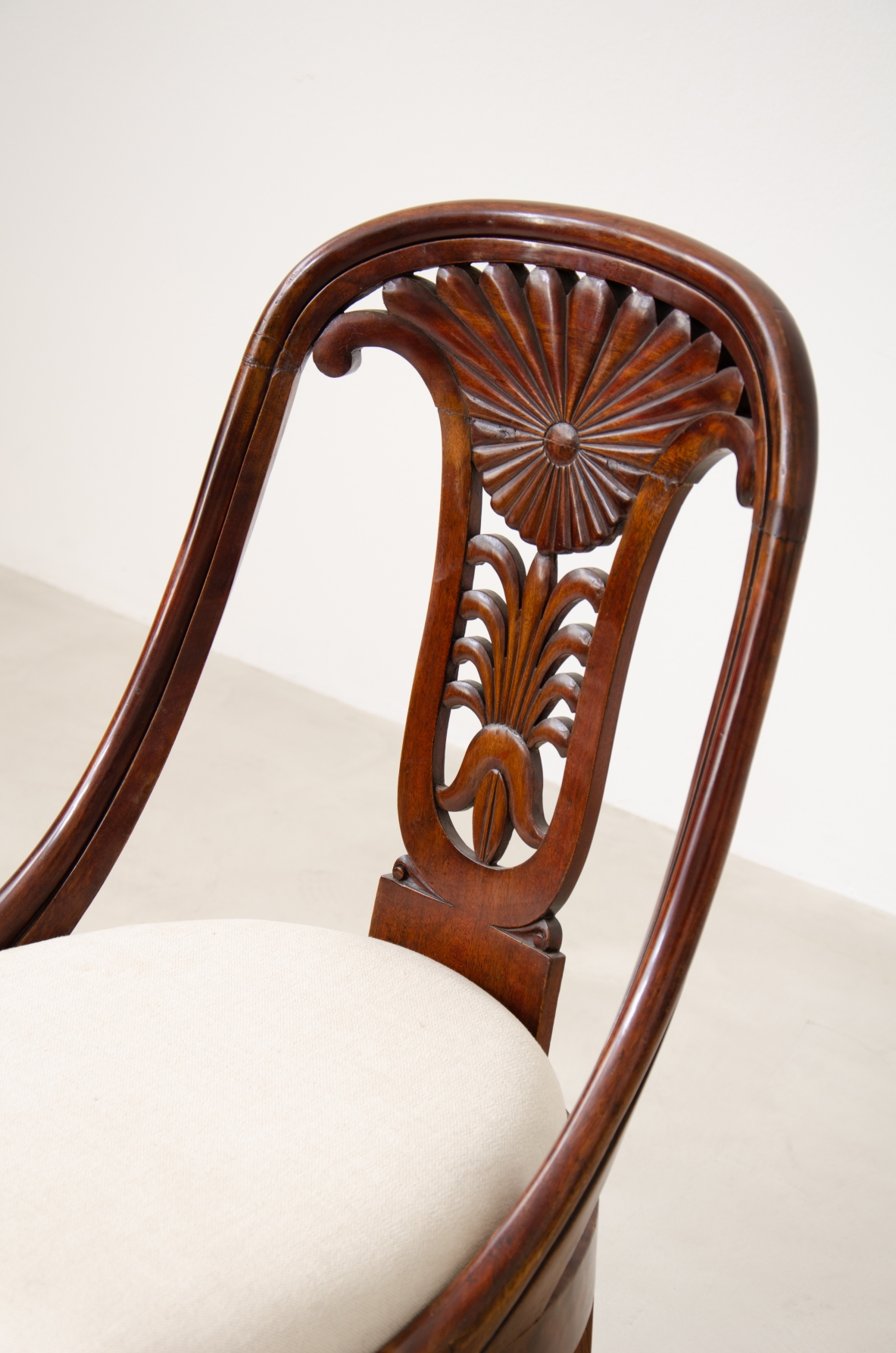 Rare set of 12 antique walnut cockpit chairs in walnut with carved back.  Charles X period,  Northern Italy, around 1830s.