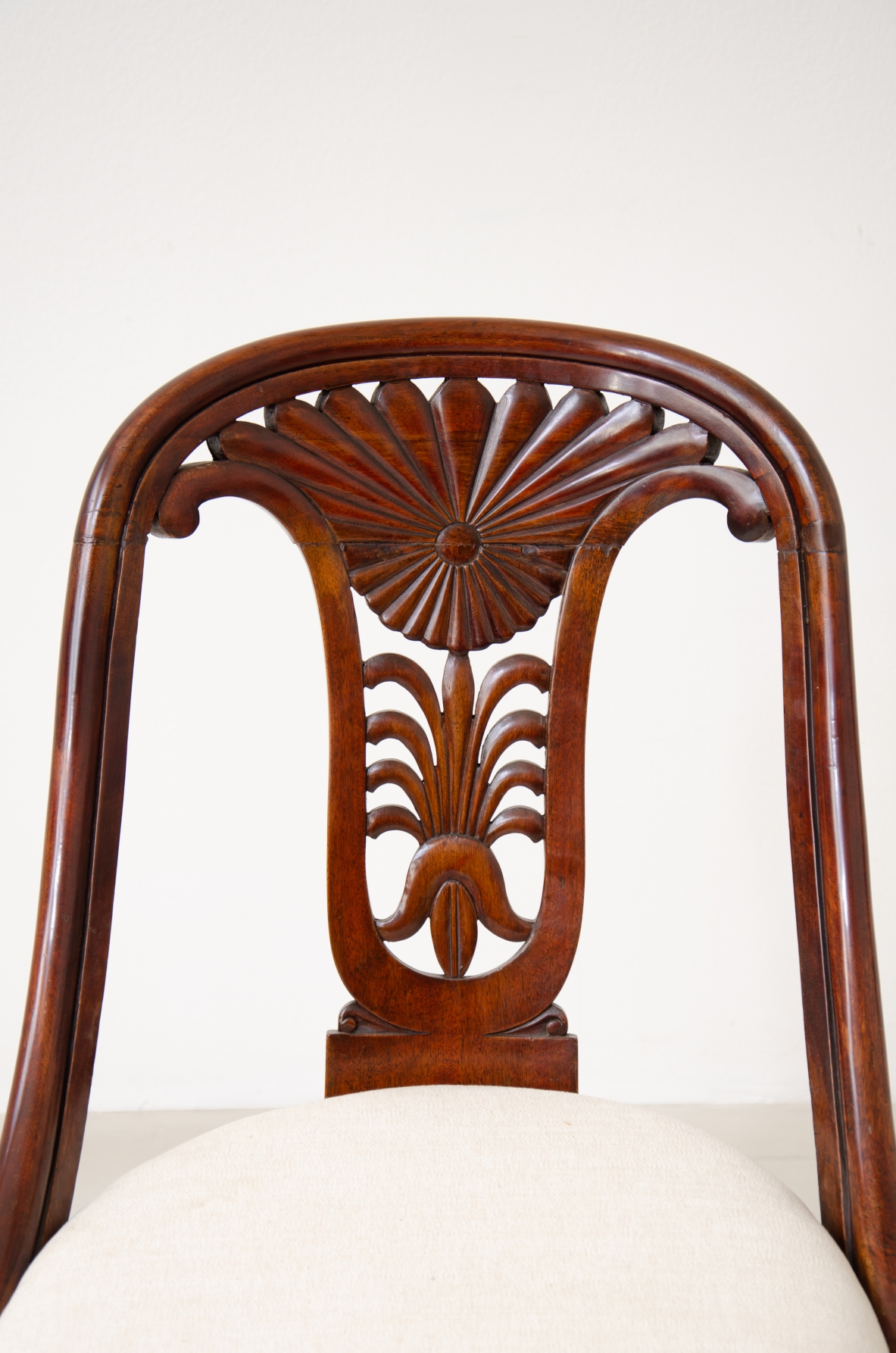 Rare set of 12 antique walnut cockpit chairs in walnut with carved back.  Charles X period,  Northern Italy, around 1830s.