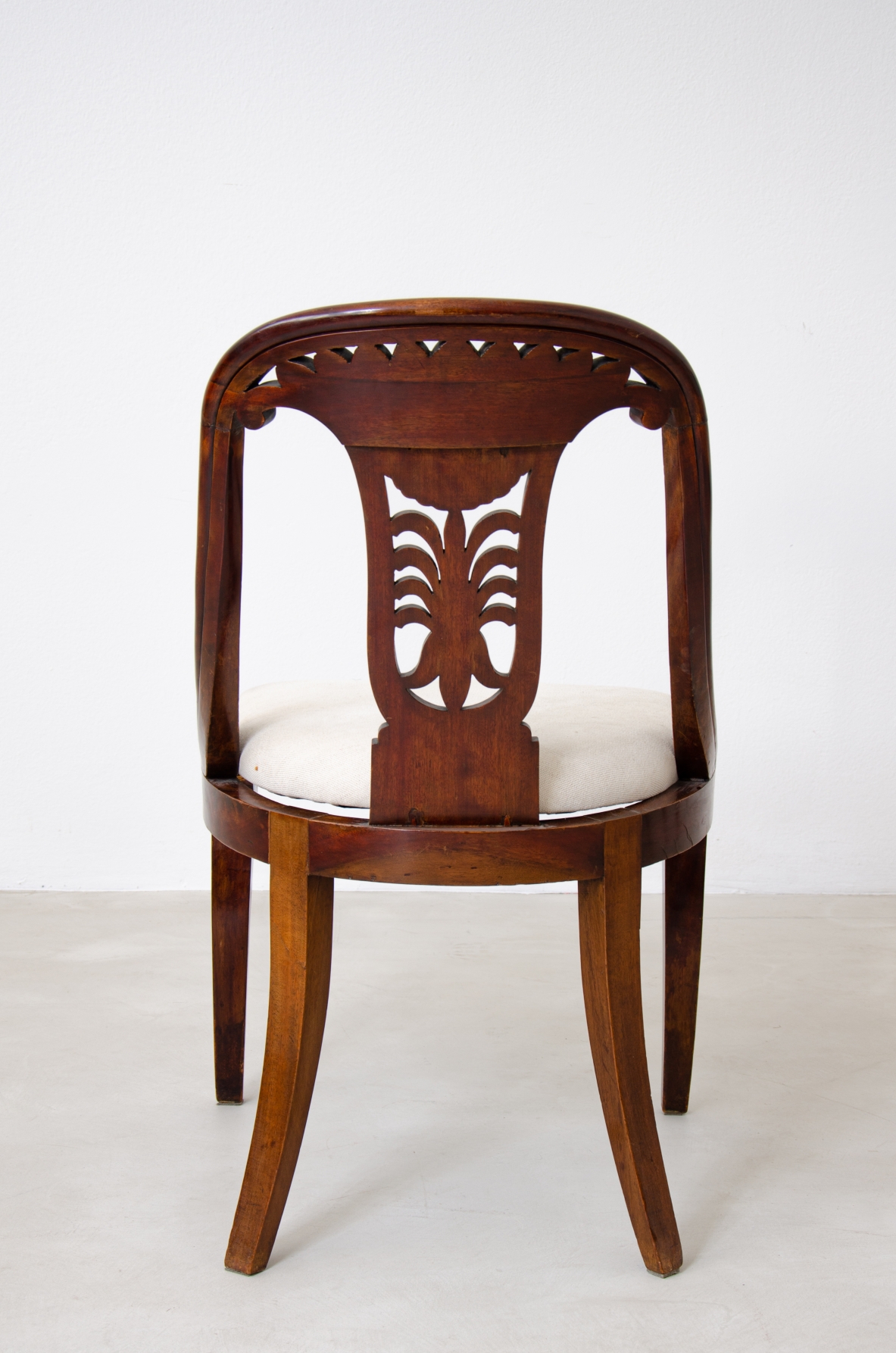 Rare set of 12 antique walnut cockpit chairs in walnut with carved back.  Charles X period,  Northern Italy, around 1830s.