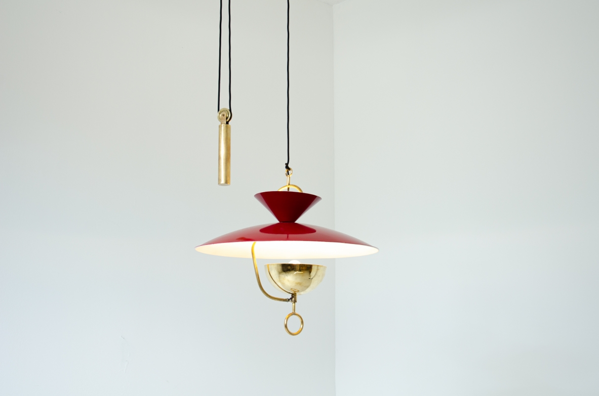 Rare 6-light adjustable chandelier in lacquered metal and brass with counterweight and pulleys.  Italian manufacture, 1940's.